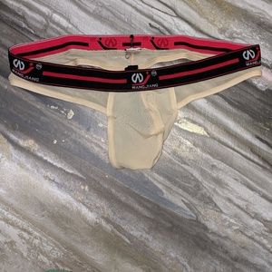 Men's nude mesh thong